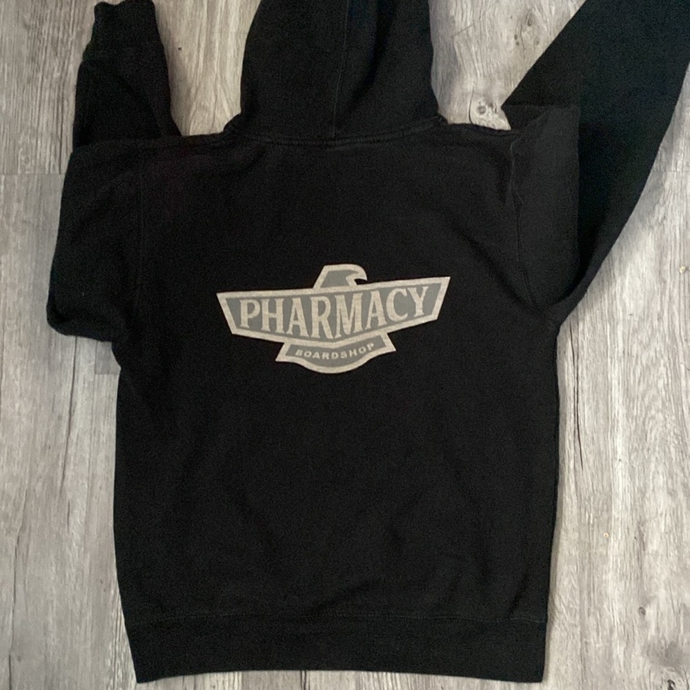 ZUMIEZ Black Pullover Hoodie with PHARMACY Boardshop Logo Skater